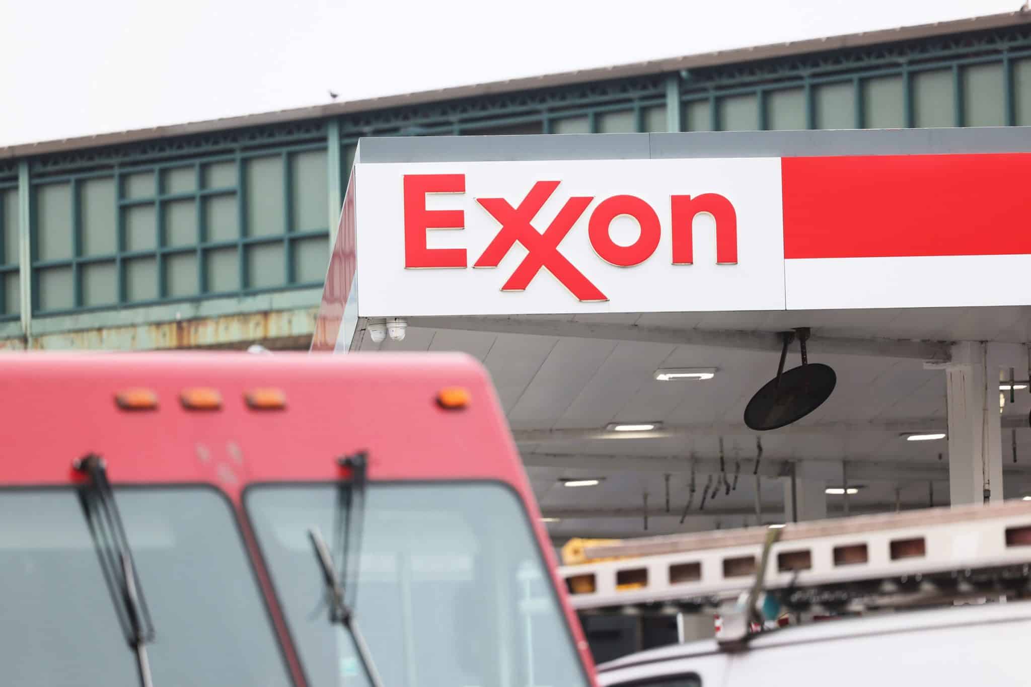 A truck is seen outside of an exxon mobil gas station